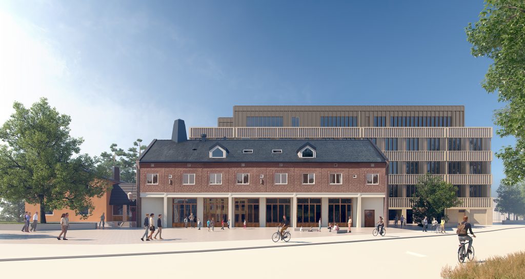 Midsommarkransens skola. Äldre brandstation i rött tegel och den nya femvåningsbyggnaden i trä.