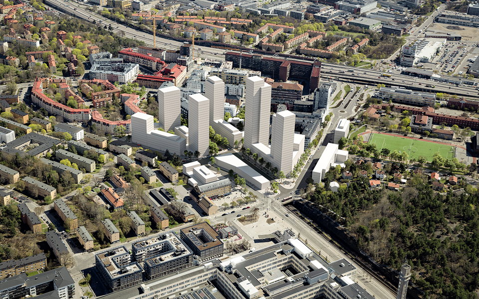 Sju höghus blandas med läge bebyggelse för att skapa en enhetlig känsla i stadsdelscentrat. 